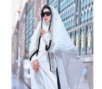 6. Gamis Putih Lambangkan Hati Suci Syahrini