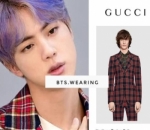 Jin BTS menggunakan <i>Herritage Tartan Suit</i>