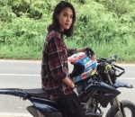 Naik motor trail