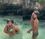 Ajak Anak Lokal Berenang