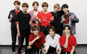 Rayakan 2 Tahun Debut, NCT 127 Adu Ganteng Pakai Jas di Foto Ini