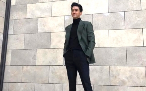 Bagikan Foto di Taman, Siwon Disamakan dengan Anjingnya