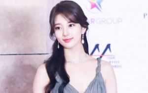 Kerennya Suzy Naik Mobil Jeep Hingga Pegang Pistol di Foto Perdana 'Vagabond'