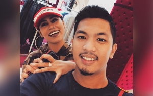 Pamer Kemesraan, Suami Evi Masamba Isyaratkan Rumah Tangga Baik-Baik Saja