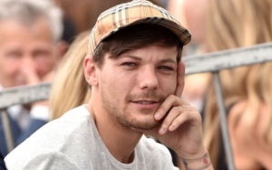 Jarang Terekspos, Wajah Ganteng Anak Louis Tomlinson Bikin Penggemar Kagum