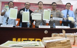 Rugikan Negara Rp 30 Miliar, Polisi Bekuk 9 Pelaku Pemalsuan Materai