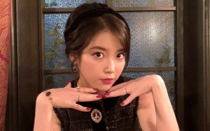 IU Super Imut Foto Bareng Aktor Cilik 'Hotel Del Luna', Bagian Tubuh Ini Jadi Sorotan