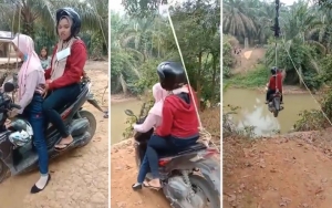 Unik dan Inovatif, Pemotor Ini Nekat Seberangi Sungai Dengan Flying Fox