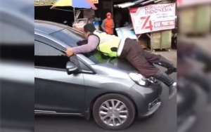 Akhir Mengharukan Insiden Polisi 'Nemplok' Mobil di Pasar Minggu