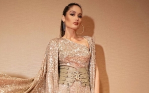Intip Cara Unik Cinta Laura Rayakan Hari Batik Nasional, Aksi Basah-basahan Curi Perhatian