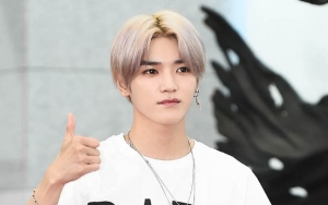 Taeyong NCT Pamerkan Tato Baru di Konser SuperM, Asli?