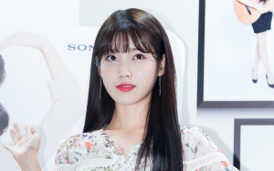Dandanan Keren IU Bergaya Rocker di Bandara Tuai Decak Kagum