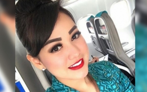 Akun Palsu Pramugari Puteri Novita Sebar Foto Seksi Berbikini Ngode Liburan