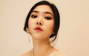 Isyana Sarasvati Pajang Foto Lawas Saat 'Ditembak' Tunangan 12 Tahun Lalu, Masih Pakai Seragam SMP!