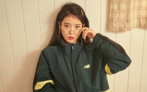 IU Liburan ke Spanyol Bareng Keluarga, Gaya Cantik dan Imut Tuai Pujian Selangit