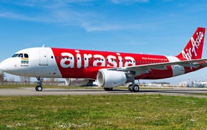 Corona Bikin Industri Penerbangan Kembang Kempis, Air Asia Bakal Merger dengan Maskapai Ini?