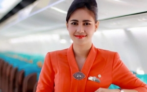 Penumpang Protes Tak Bisa Lihat Senyum, Pramugari Garuda Indonesia Tidak Akan Pakai Masker