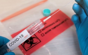 Tak Perlu Tes Swab, Inggris Lakukan Uji COVID-19 Hanya Lewat Air Liur