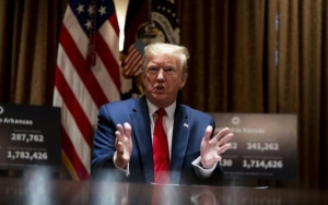 Trump Yakin Virus Corona Hilang Dengan Sendirinya Meski Kasus di AS Terus Melonjak Tajam