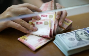 Kasus COVID-19 di Indonesia yang Terus Meningkat Bikin Rupiah Ikut Melemah