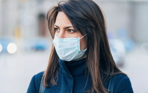 Pemerintah Ungkap Bahaya yang Mengintai Jika Masker Dikaitkan ke Dagu