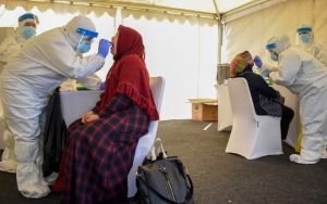 Kasus COVID-19 RI Tembus 100.000 Lebih, Pemerintah Dinilai Kehabisan Akal