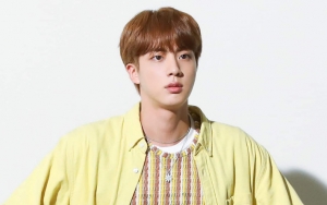 Jin BTS Pamer Boneka Raksasa Maple Story, Netizen Salfok Lemari Penuh Piala