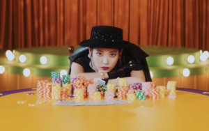 IU Tampilkan Pesona Karismatiknya Dalam Teaser MV Retro Untuk Lagu 'Coin'