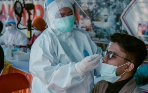 RI Pecah Rekor Catat 21.095 Kasus COVID-19 Dalam Sehari, BNPB Bahas Warga Tolak Tes Swab Gratis 