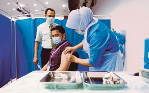  Lebih Dari 50 Persen Warga Malaysia Disebut Telah Mendapatkan Vaksinasi COVID-19 Penuh