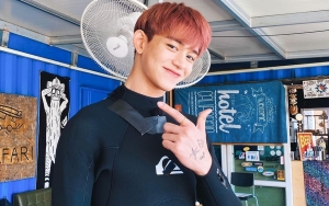 Beredar Foto Poster Besar Lucas WayV di Gerobak Sampah