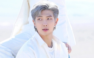 Potret RM BTS Healing di Kuil Bikin Adem, Penampilan Sederhana Tuai Sorotan