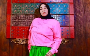 Penampilan Melly Goeslaw Disebut Manglingi Pasca Operasi, Pipi Tirus Ikut Disorot