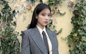 Penampilan Unik IU Kenakan Setelan Jas di Milan Fashion Week Tuai Perhatian