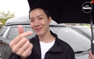 Bikin Heboh, Beredar Foto J-Hope BTS Pegang Senjata Laras Panjang dengan Seragam Tentara