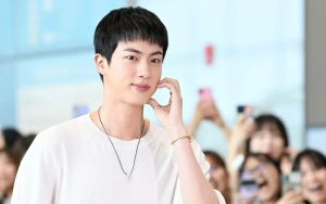 Jin BTS Diduga Pakai Rambut Palsu Saat Estafet Obor Olimpiade Paris 2024