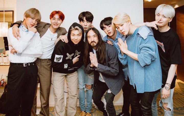 Kolaborasi Steve Aoki dan BTS, MV 'Waste It On Me' Hadirkan Ross Butler-Ken Jeong Cs