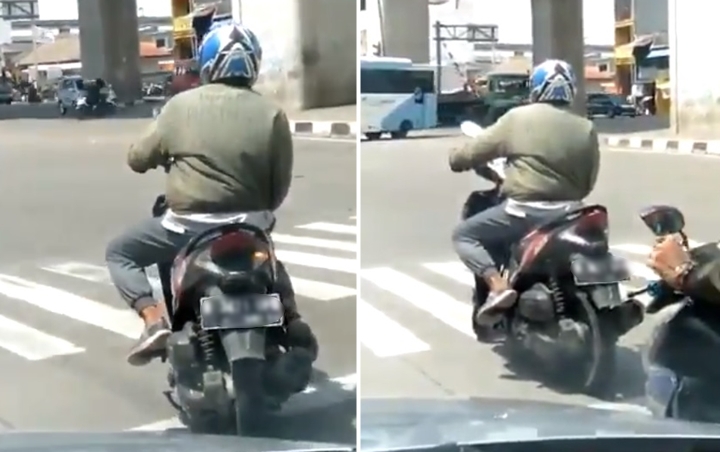 Pengendara Motor Ini Sakti Tak Injak Tanah Saat Berhenti di Lampu Merah, Netter Ngakak