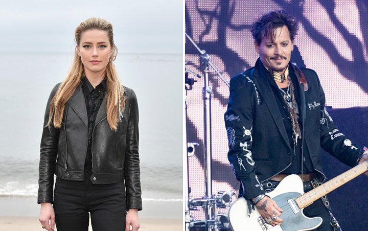 Amber Heard Bantah Pernah Sundut Rokok ke Wajah Johnny Depp