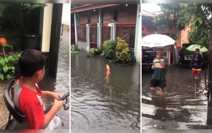 Bocah Mancing di Kala Banjir