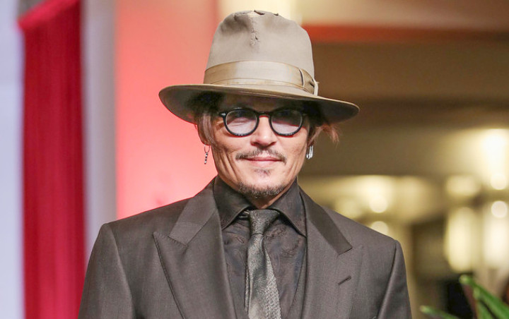 Johnny Depp Tuntut Surat Kabar yang Bela Amber Heard