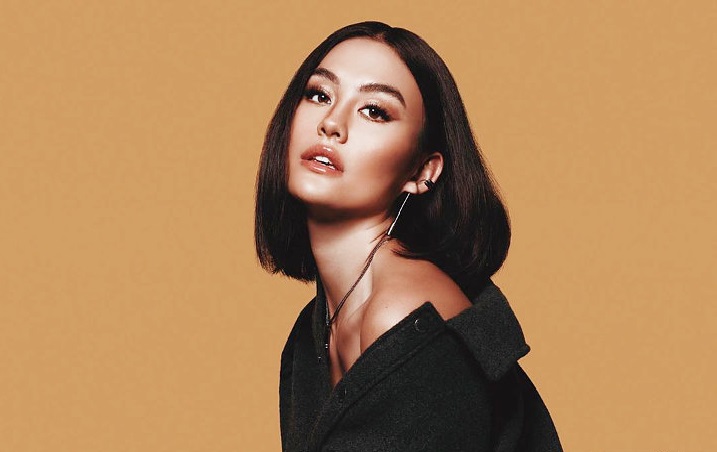 Agnez Mo Ungkap Rahasia Ini Saat Rilis Single 'Promises' di Konser Amal Internasional