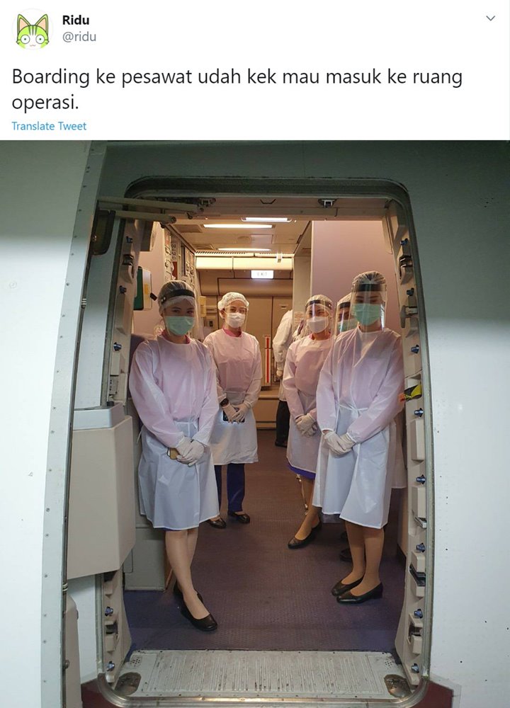 Beredar Foto Pramugari Gunakan APD di Dalam Pesawat, Ini Kata Ahli Virologi