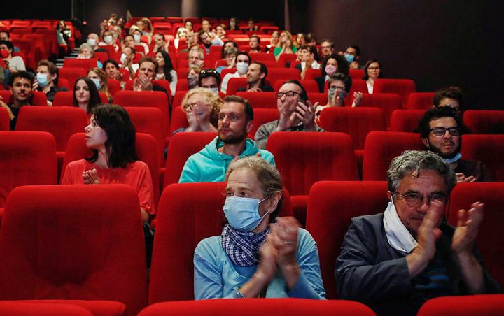 Kembali Dibuka, Bioskop Inggris Wajibkan Penonton Gunakan Masker Selama Pandemi