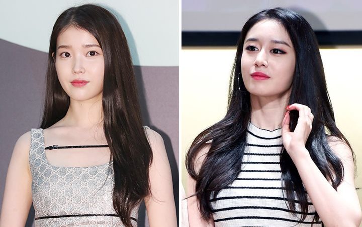 IU dengan nakal bersembunyi di balik pintu untuk menakuti teman dekatnya selama 12 tahun. 'On and Off' episode IU dan Jiyeon bakal ditayangkan 10 Oktober mendatang.