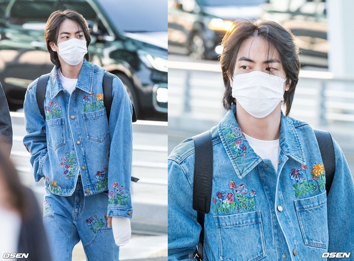 Jin BTS Muncul di Bandara dengan Tangan Di-gips 2