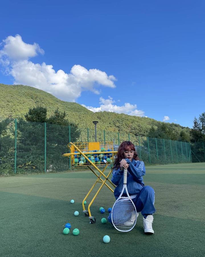Bermain Tenis