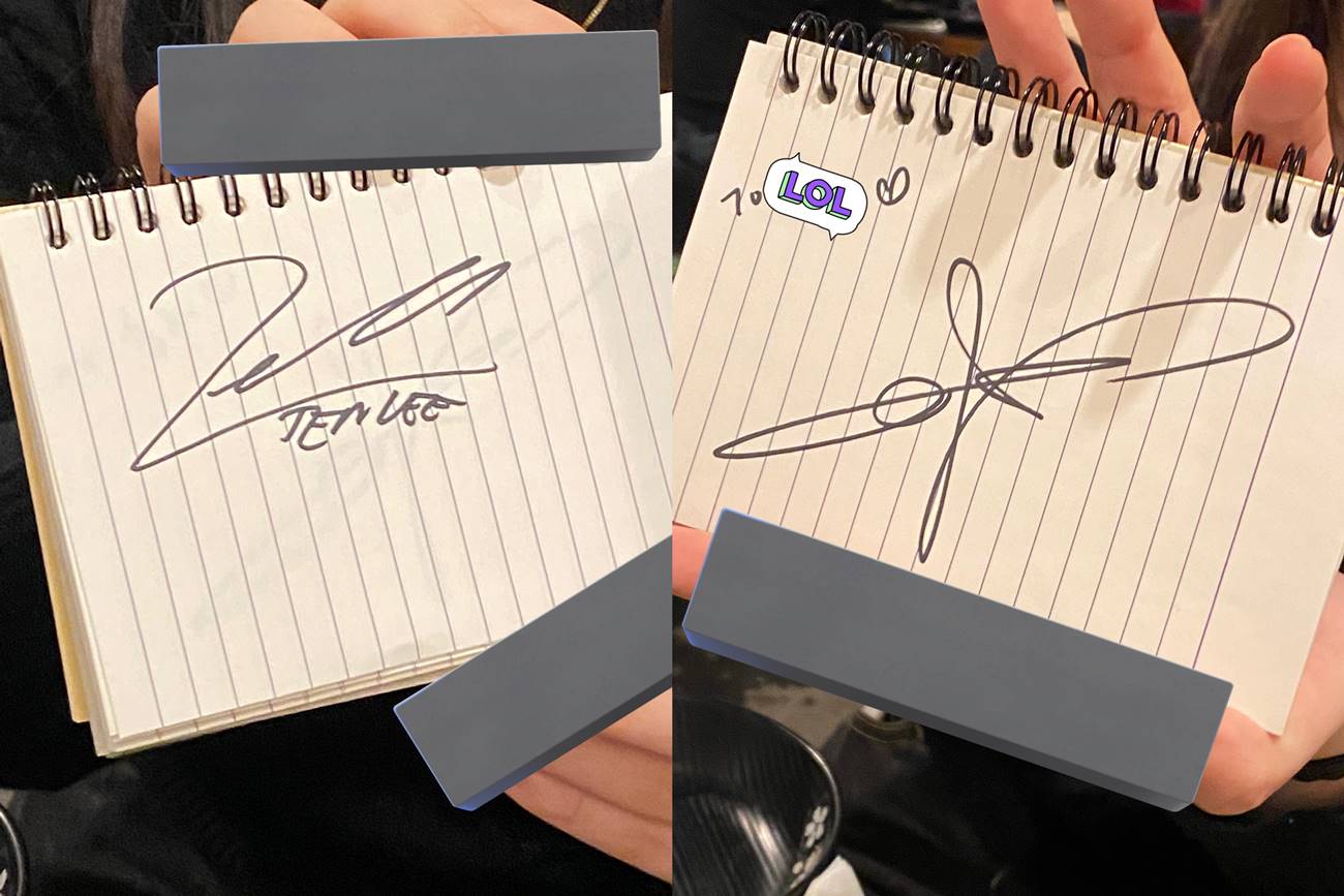 Ten dan Renjun NCT memberikan tanda tangan kepada seorang penggemar