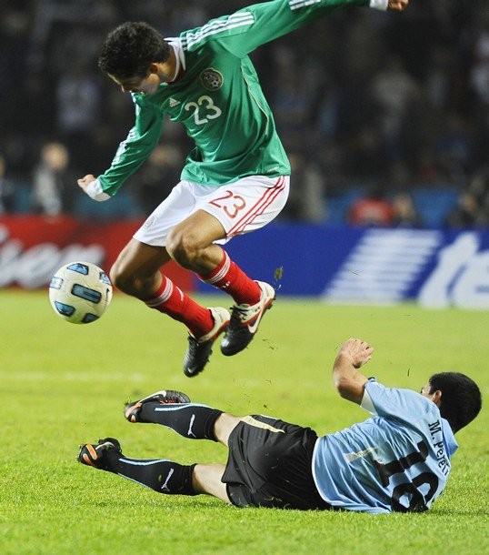 Foto Uruguay masuk ke perempat final setelah mengalahkan Meksiko dengan skor tipis 1-0