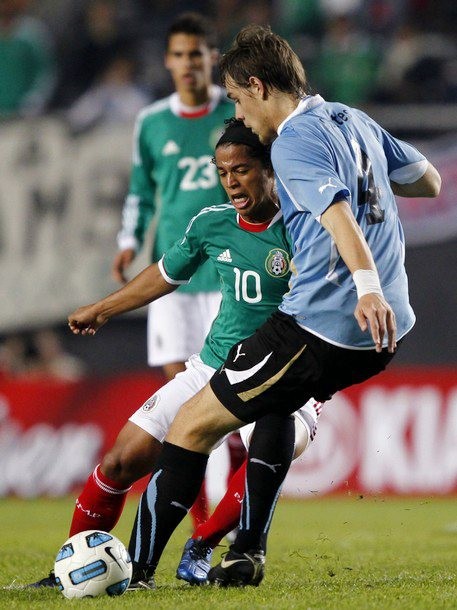 Foto Uruguay masuk ke perempat final setelah mengalahkan Meksiko dengan skor tipis 1-0